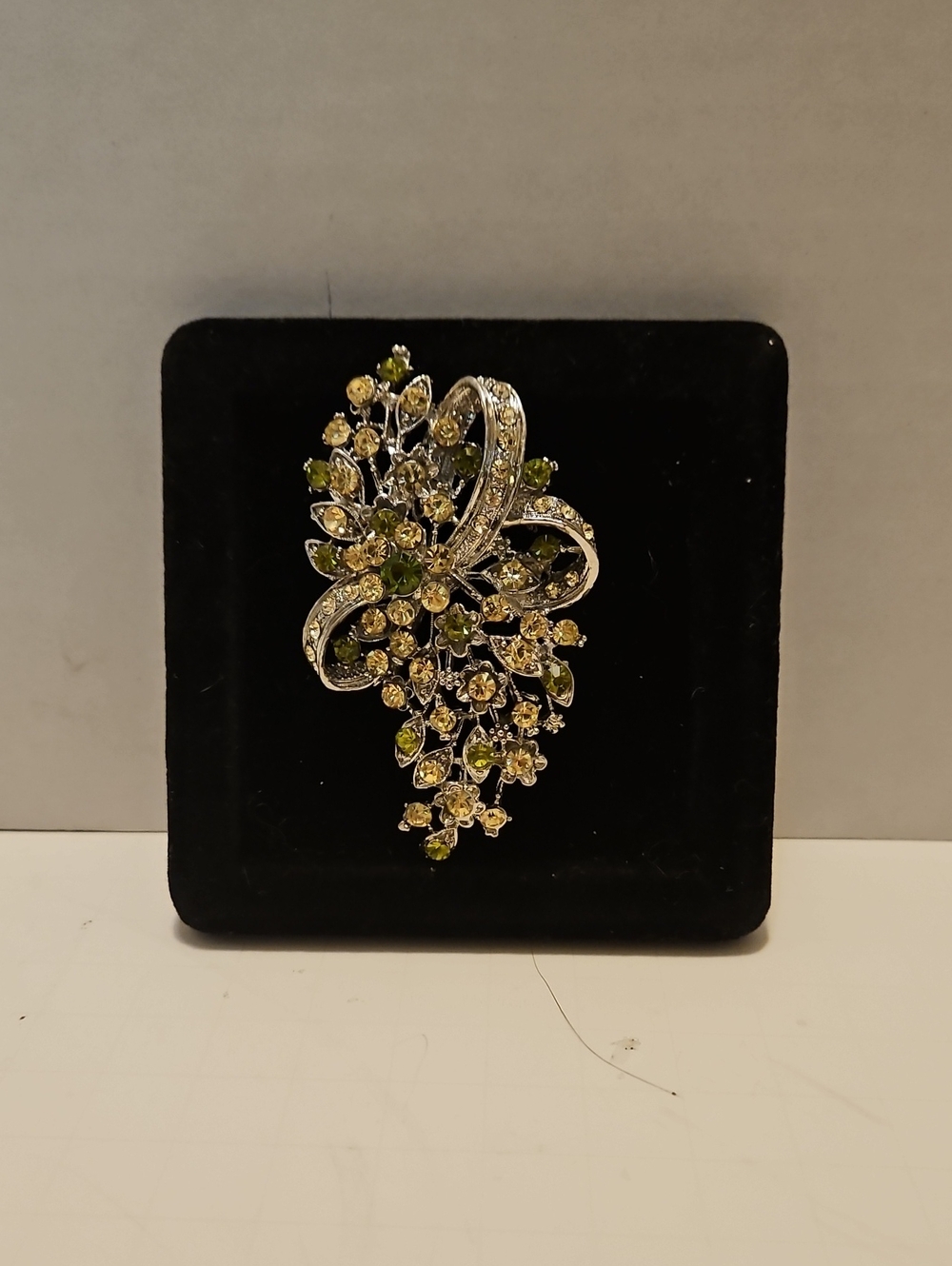 Silver-Tone Green Crystal Floral Cascade Brooch